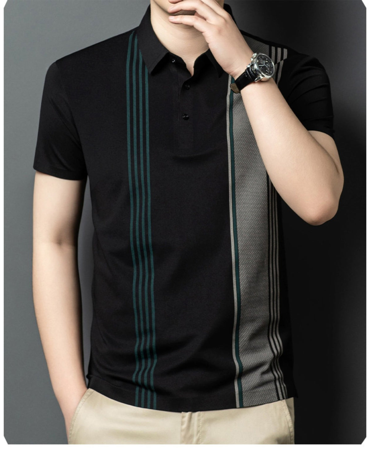Model wearing Wrap Wolf black short sleeve polo with teal and grey vertical stripe panel design