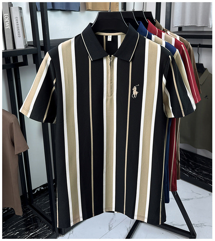 Front view of Wrap Wolf black and cream vertical stripe textured knit zip polo