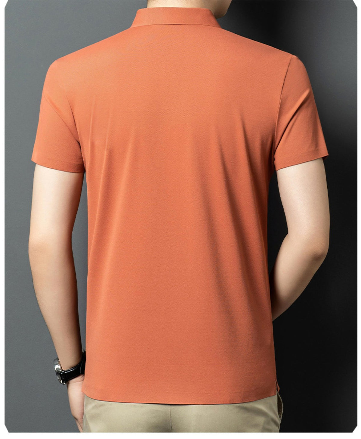 Back view of Wrap Wolf burnt orange short sleeve polo showing clean solid rear design